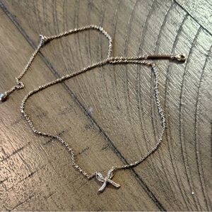 Kendra Scott rose gold bow necklace comes with pouch and box